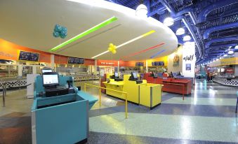 a modern supermarket with various food items on display , such as fruits and vegetables , in the kiosks at Disney's All-Star Music Resort