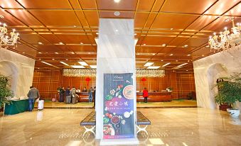 A large sign in the lobby of an oriental restaurant, with people inside and outside at Rayfont Hotel & Apartment Chengdu