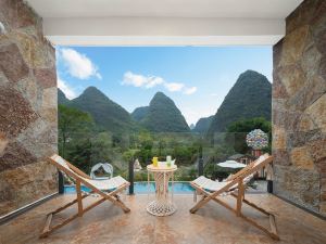 Yinxin Valley Net Red Travel Photography and Hot Spring Resort (Yulong River Scenic Area Store)