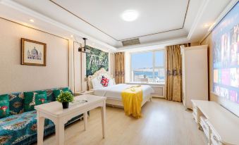 Ganghui Four Seasons Hotel Apartment (Dalian Railway Station Zhongshan Square)