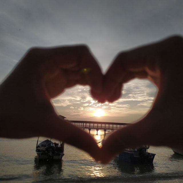 Sunset Serenity: Boats and Beauty at Perhentian Island