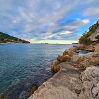 Morning Serenity: A Family Stroll at Uvala Lapad Beach