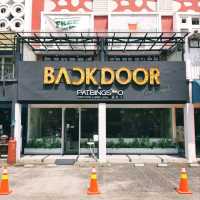 THE NAME OF THE PLACE REMINDS ME OF ONE OF STRAY KIDS' SONGS, "BACKDOOR."