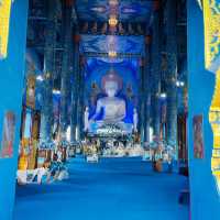 The Enchanting Blues of Chiang Rai: A Day at Wat Rong Suea Ten