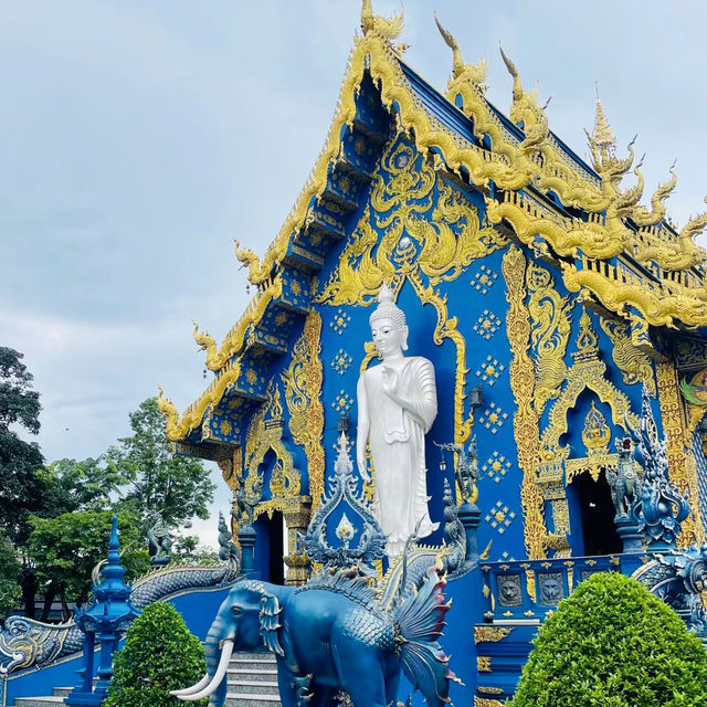 The Enchanting Blues of Chiang Rai: A Day at Wat Rong Suea Ten