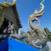 The Enchanting Blues of Chiang Rai: A Day at Wat Rong Suea Ten