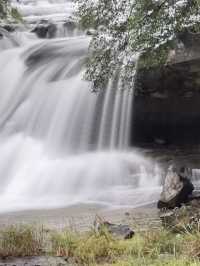 Exploring scenic waterfalls of Shifen. 