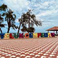 **"Relaxing Day at Teluk Cempedak Beach: Scenic Views and Convenient Amenities"**