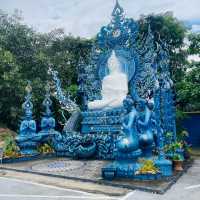 The Enchanting Blues of Chiang Rai: A Day at Wat Rong Suea Ten