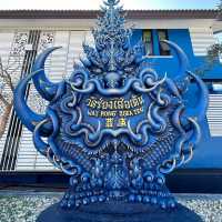 The Enchanting Blues of Chiang Rai: A Day at Wat Rong Suea Ten