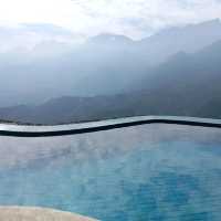 Awesome infinity pool with train passing by in Sapa: Viettrekking Hotel