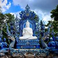 The Enchanting Blues of Chiang Rai: A Day at Wat Rong Suea Ten