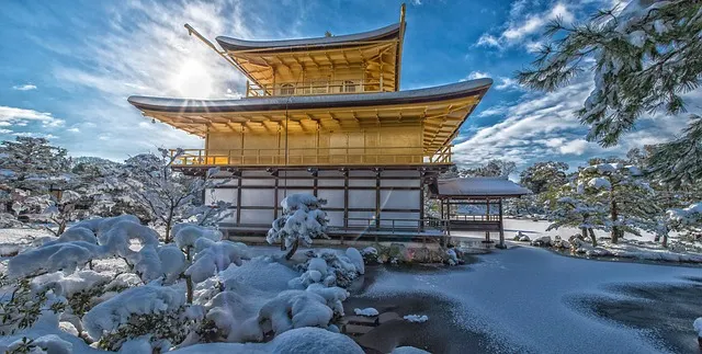 kyoto temple - A view of Kinkakuji Temple after snow