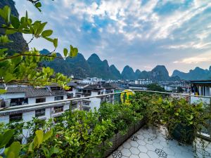 Yangshuo West Street Yanbang American Family Apartment (Yangshuo West Street Shop)