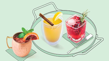 Kombucha Mule, Spiced Hot Toddy, Cranberry- Apple Fizz Drinks on illustrated serving tray