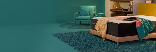 Cocoon mattress in styled room with teal gradient background