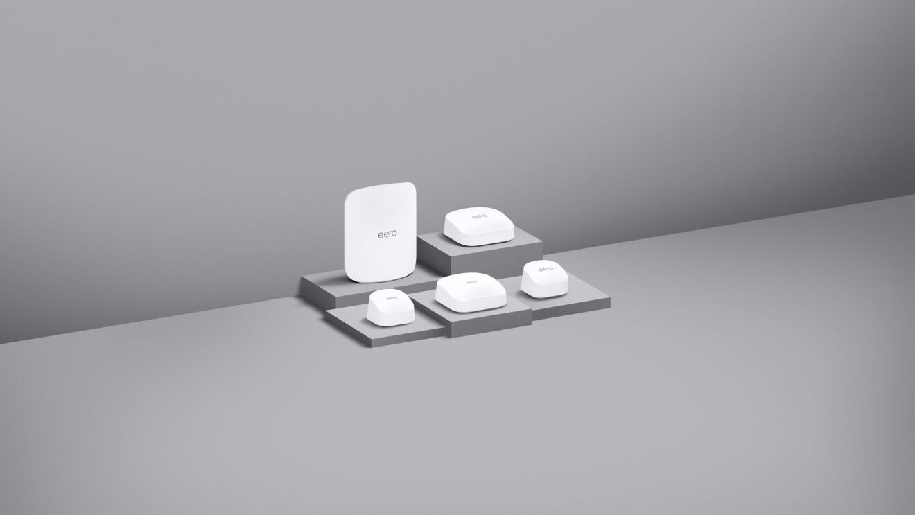 Eero mesh WiFi router products on gray surface