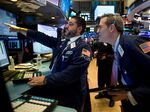 Traders work on the floor of the New York Stock Exchange.