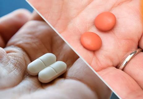 Hands holding two different kinds of pain medications separated by a white line