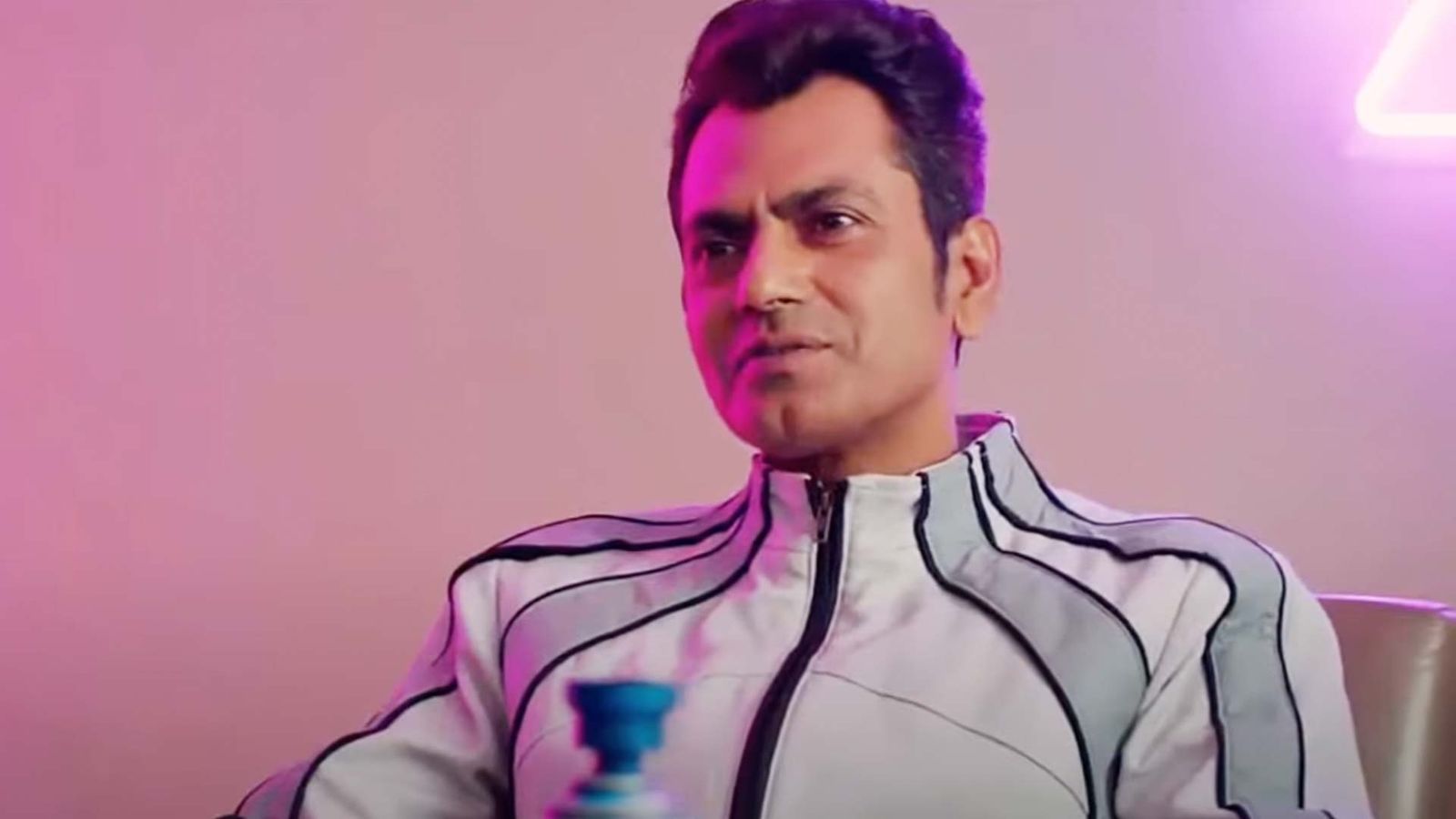 Image may contain Nawazuddin Siddiqui Purple Head Person Face Performer Solo Performance Photography and Portrait