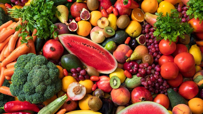 top-down view of a colorful variety of fruits and vegetables