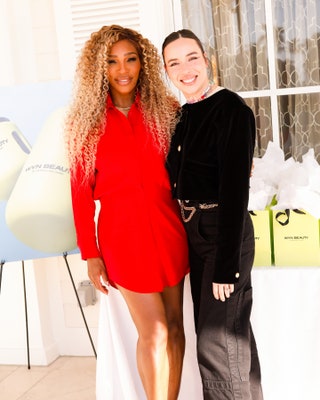 Image may contain Serena Williams Adult Person Accessories Jewelry Necklace Hair Face Happy Head Smile and Bag