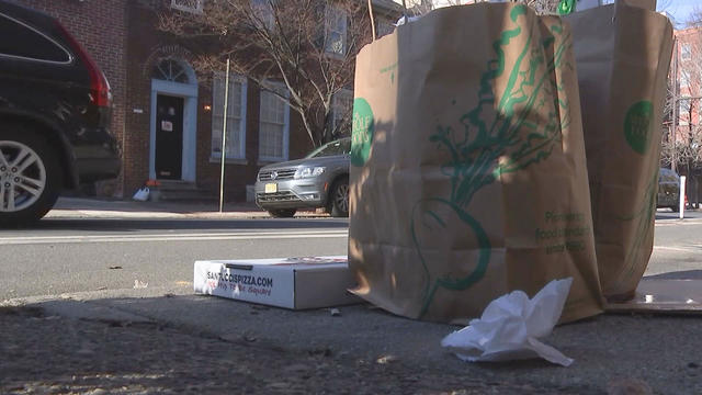 Bags of trash on the side of a Philadelphia street 