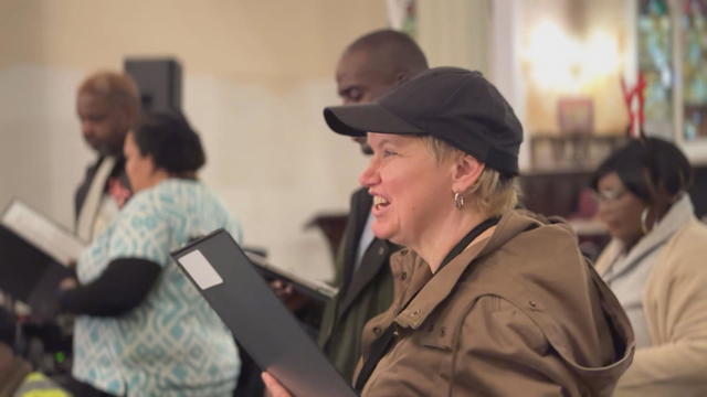 Members of the choir sing 