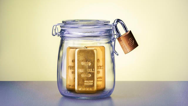 Gold bullion bars in safe. Gold bar investment in the future concept. Gold metal it real wealth. 