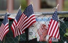 A memorial stands outside the Inland Regional Center, where 14 people were massacred by a married couple inspired by Islamist militants in San Bernardino, California, Jan. 4, 2016. 