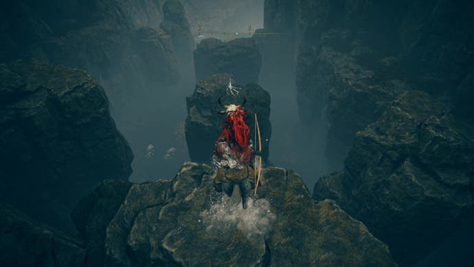 A warrior jumps onto a rocky platform on the way to the Cerulean Coast in Elden Ring Shadow of the Erdtree.