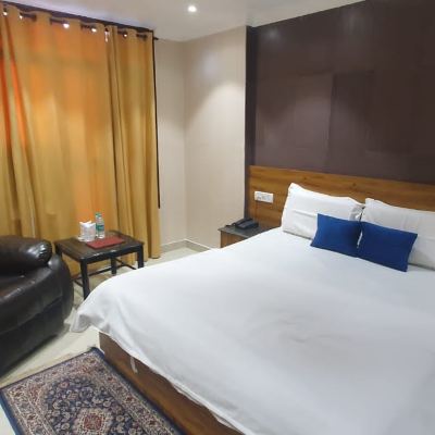 Deluxe Room Hotel Surya Excellency Promo Code