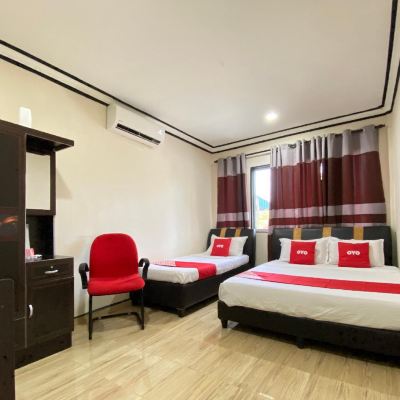 Deluxe Triple Room OYO 90205 Bayu Sintok Motel Promo Code