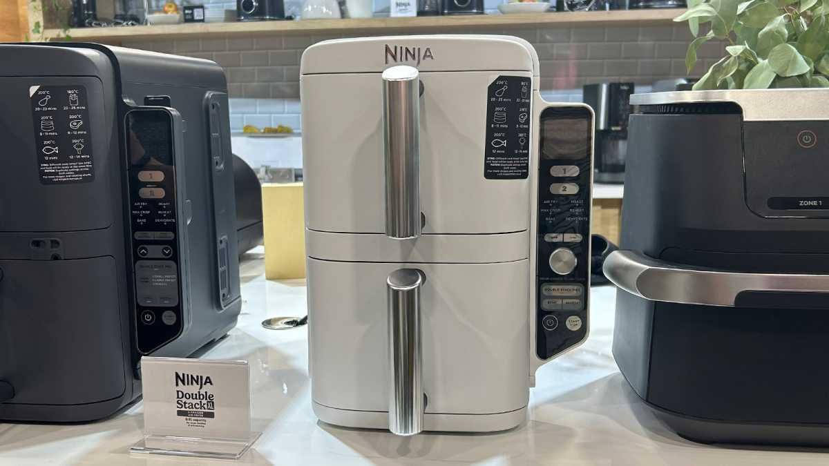 White Ninja Double Stack on a counter, between two other air fryers