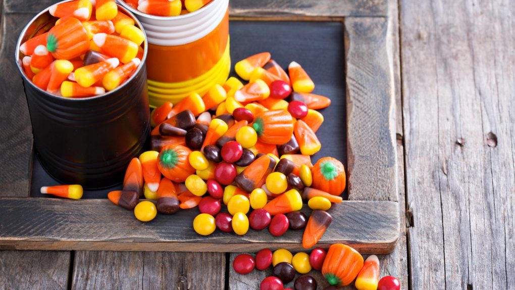 Halloween candy corn in two jars.