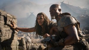 Staz Nair as Tarak and Djimon Hounsou as General Titus in Rebel Moon — Part Two: The Scargiver.