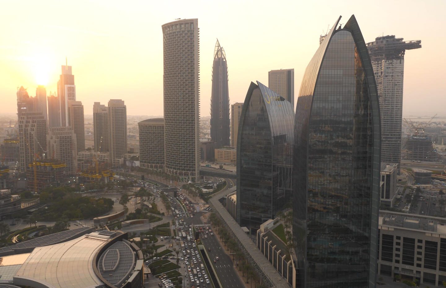 buildings of the future skyline at sunset