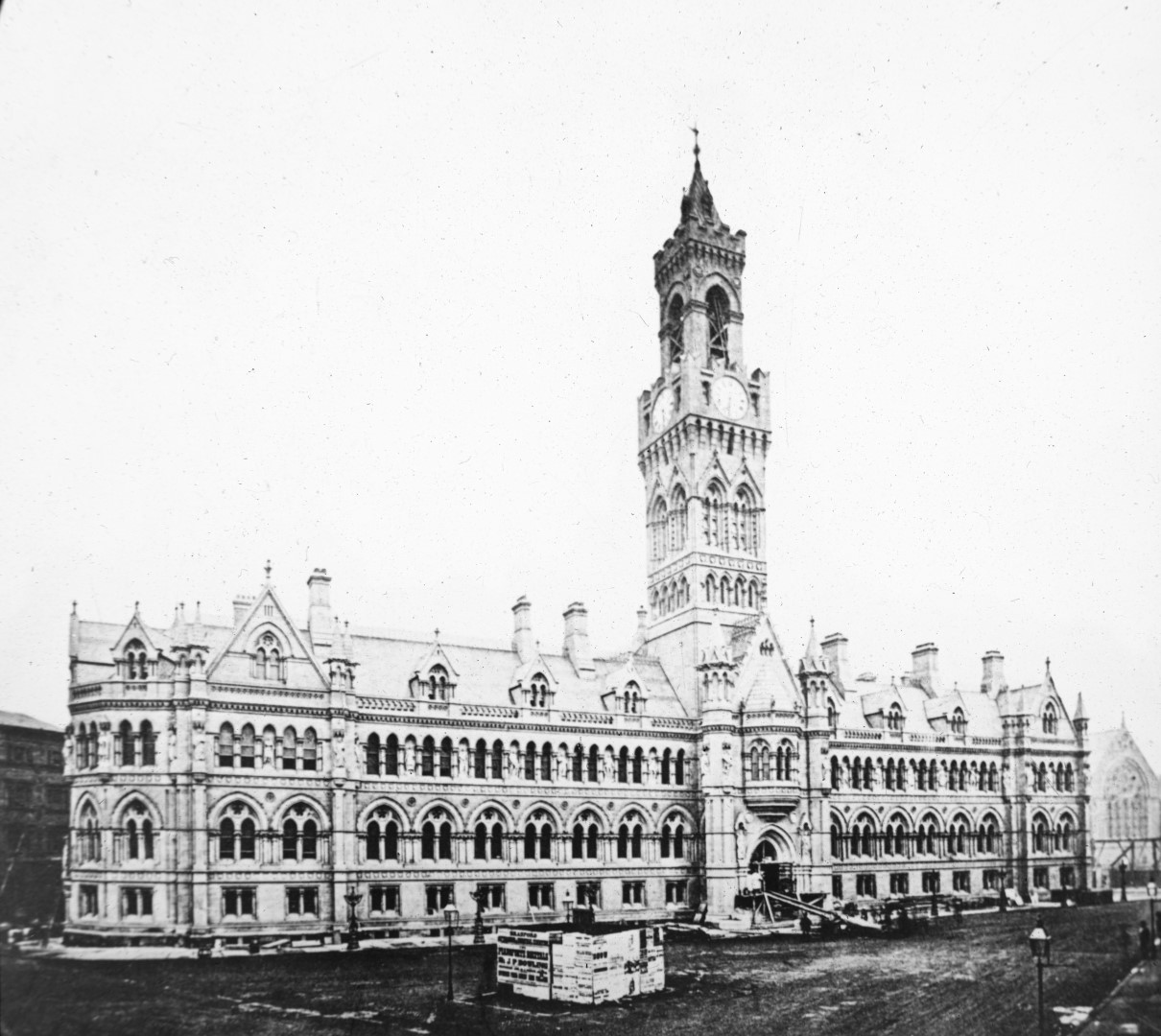 The new Bradford Town Hall being constructed. The building’s exterior looks completed with some building materials surrounding it and outside the entrance