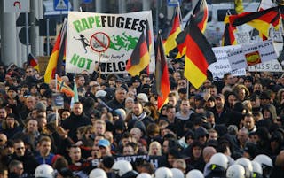 Supporters of anti-immigration right-wing movement PEGIDA protest in Cologne