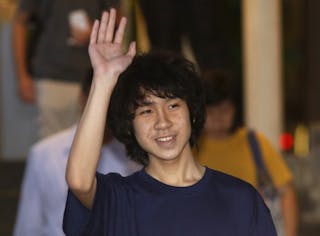 Amos Yee leaves the State Court after his trial in Singapore