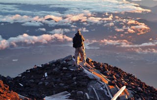 travel trip A photographer capturing view from Mt Fuji