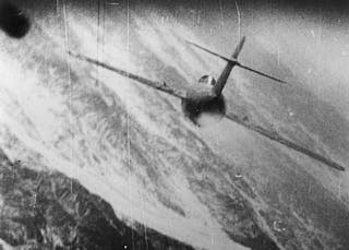 640px-MiG-15_being_hit_over_Korea_c1953