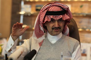 Saudi Prince Alwaleed bin Talal speaks during an interview with Reuters at his offices in Kingdom Tower in Riyadh