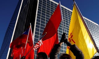 RTSVJPT  Demonstrators holds flags of China and Taiwan during Taiwanese President 