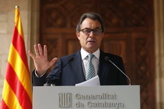 Catalan regional president Artur Mas gestures during a news conference at Palau de la Generalitat in Barcelona