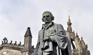 Statue of Adam Smith in Edinburgh in front of St.Giles Cathedral at Parliament Square.