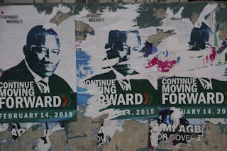 Ripped campaign posters for incumbent president Goodluck Jonathan are seen in Lagos