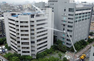 FIRFIGHTERS HOSE DOWN TAIPEI'S HO PING HOSPITAL WITH DISINFECTANT.