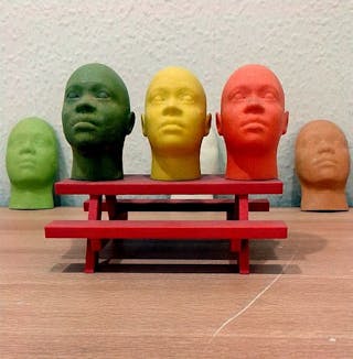 588px-Miniature_human_face_models_made_through_3D_Printing_(Rapid_Prototyping)