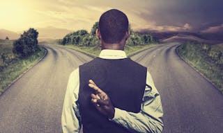 Depositphotos_64868325_l-2015 Businessman in front of two roads